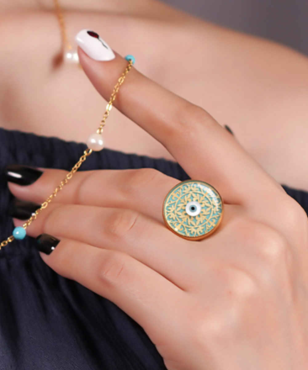 钢质印章戒指 – 绿松石树脂覆盖，镀金邪眼图案