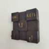 Thumbnail 5: 装饰性手工墙面钥匙挂架 – 入口立方设计