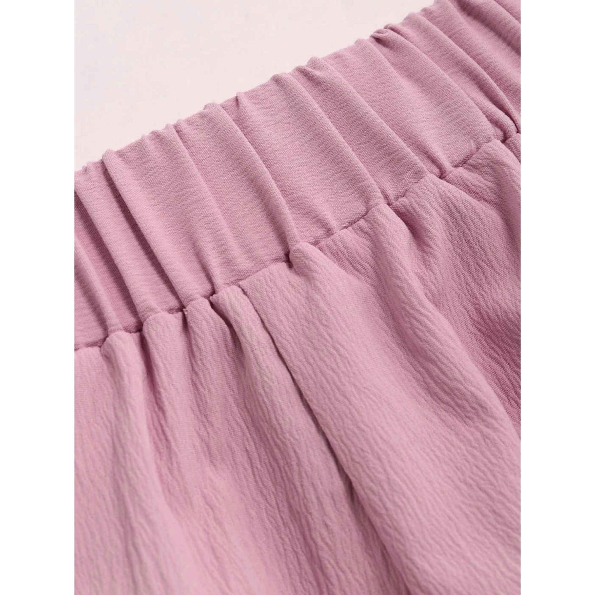 女士粉色一字肩荷叶边连体裤