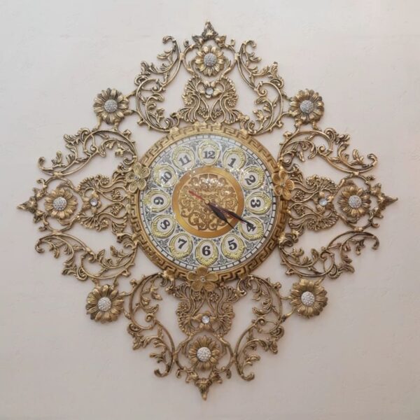 Luxurious Brass Wall Clock Featuring a Delicate Floral Accent